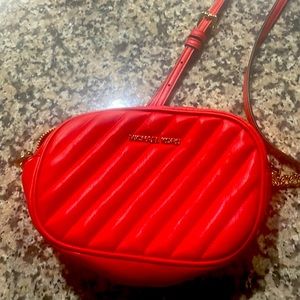 michael kors purse Tommy Hilfiger shirt colorful fanny pack